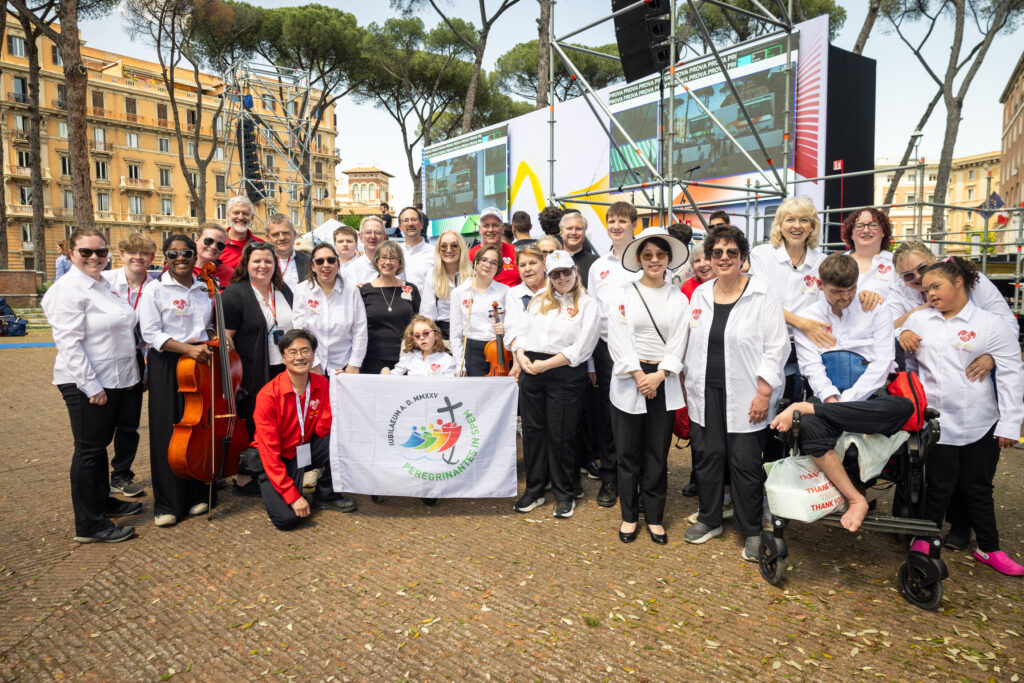 Hearts for Music (HFM), an Akron-based orchestra composed of talented musicians with special needs, was invited by the Vatican to perform on April 29 at the 2025 Jubilee of Persons with Disabilities in Rome, Italy. As the only American special needs/disability music ensemble at this historic event, they represented the entire United States and served as global ambassadors for all individuals with disabilities. This is the first time in history that a special needs music ensemble featuring the widest age range and disabilities has participated in something as unique as the 2025 Vatican Jubilee festivities. Photos show ensemble of performers and two Lake County musicians Cade and Gabi touring in Italy after their performance.