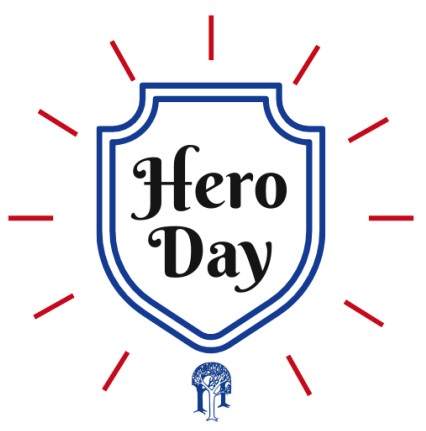 Graphic of a police badge outlined in blue with white background and words 'Hero Day' in the center and tree image at base to communicate the event is sponsored by the Lake County Board of Developmental Disabilities.